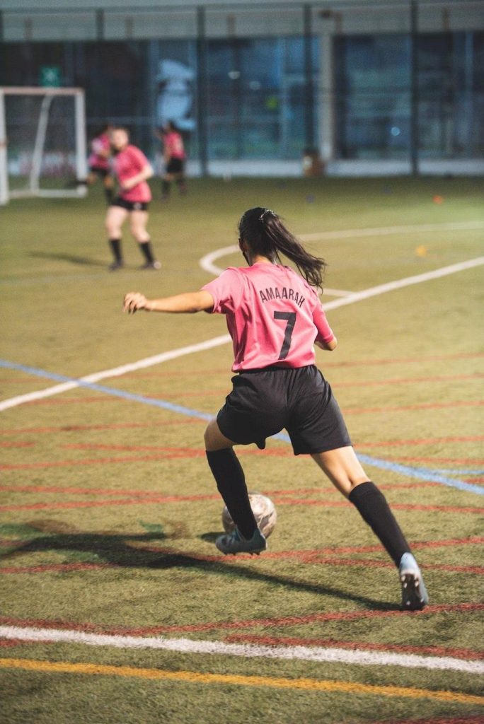 girl football pink top